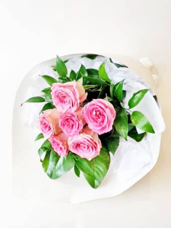 6 pink roses wrapped
